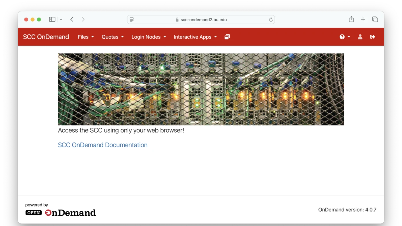 The SCC OnDemand landing page in a browser. A red menu bar runs across the top with the items SCC OnDemand, Files, Quotas, Login Nodes, Interactive Apps, an active-sessions icon, and on the right a help icon, an account icon and a log-out icon. Below it is a photograph of the cluster, the caption "Access the SCC using only your web browser!", and a link to the SCC OnDemand documentation.